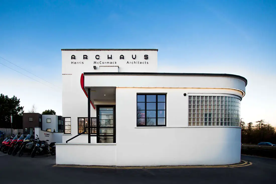 ArcHaus today: a white, curved 1930s building with its name above the entrance